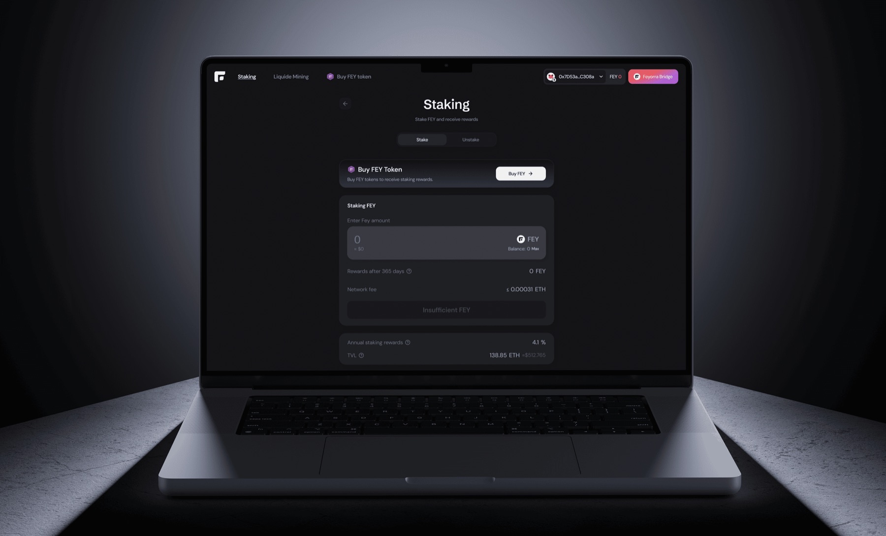 Staking screen of the DeFi dApp on a laptop
